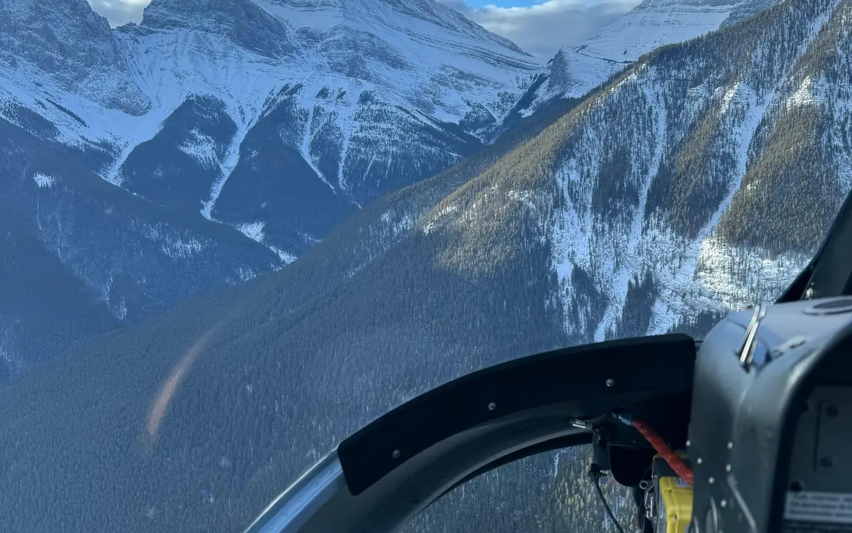 A glacier below Mount Assiniboine seen from a helicopter