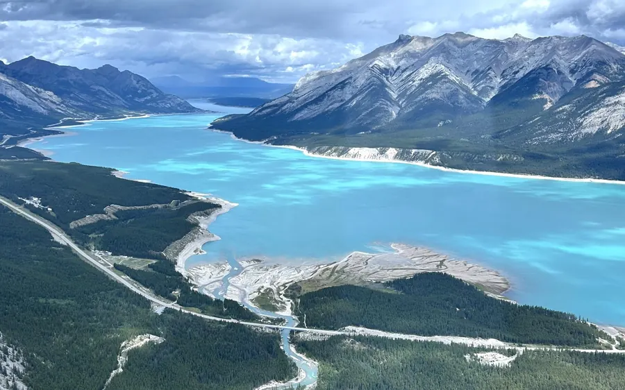 Turquoise glacial lakes in the Canadian Rockies seen from a helicopter